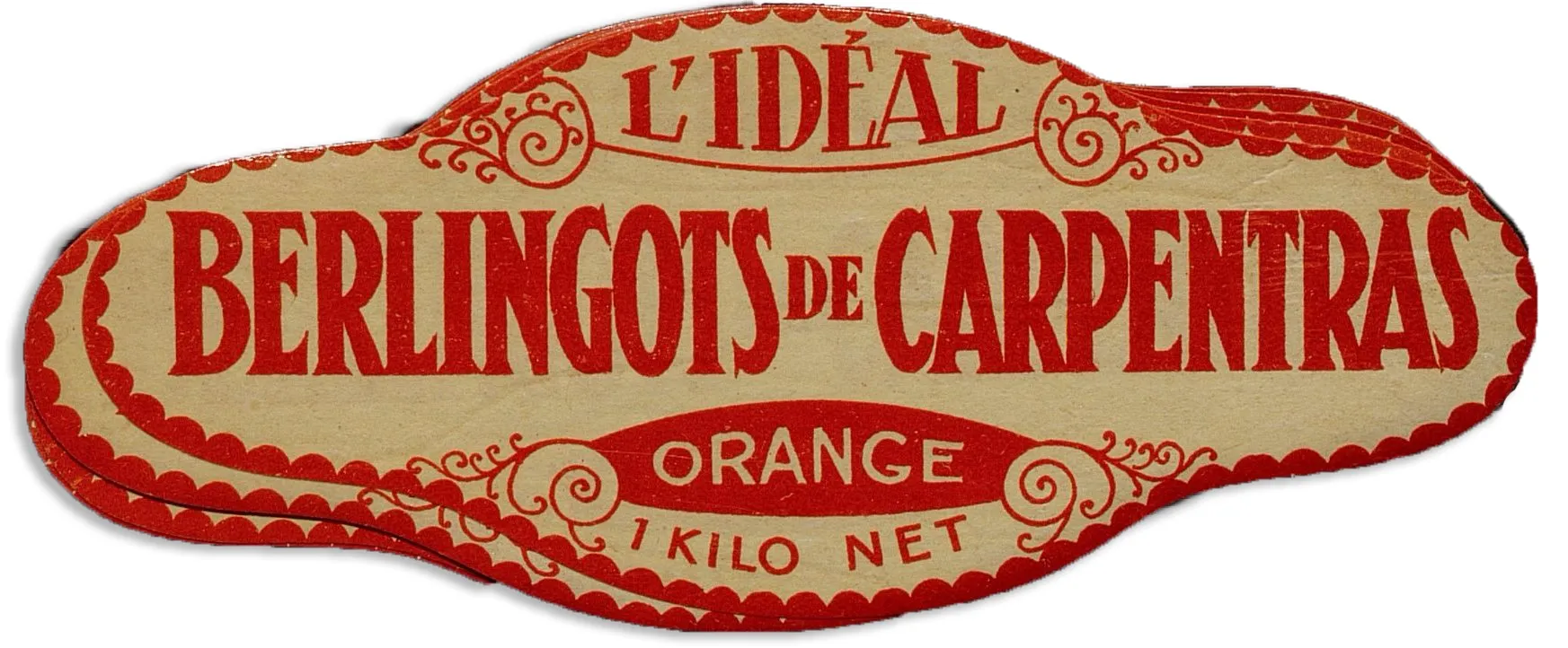 "L'idéal, berlingots de Carpentras", parfum orange, étiquette autocollante pour boîte d'un kilo, impression en rouge (14 x 6 cm). A